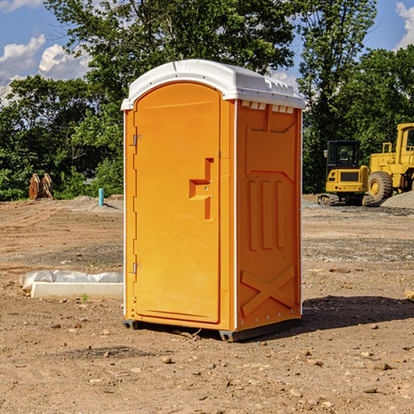 how often are the portable restrooms cleaned and serviced during a rental period in Wanda